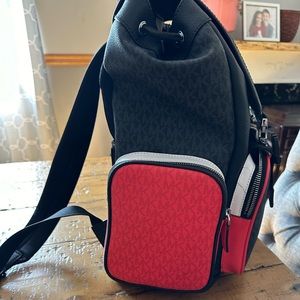 Michele kors backpack. No wear or tears. Like new. Only used for a few months.